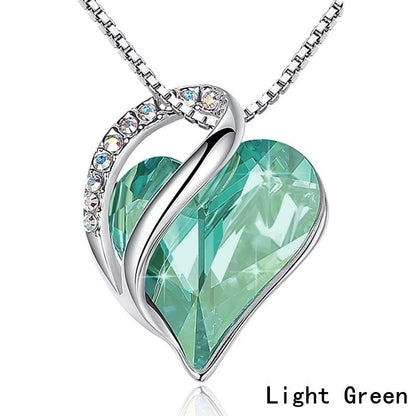 Infinity Love Heart Pendant Necklace adorned with birthstone crystals — a stunning jewelry gift for women.